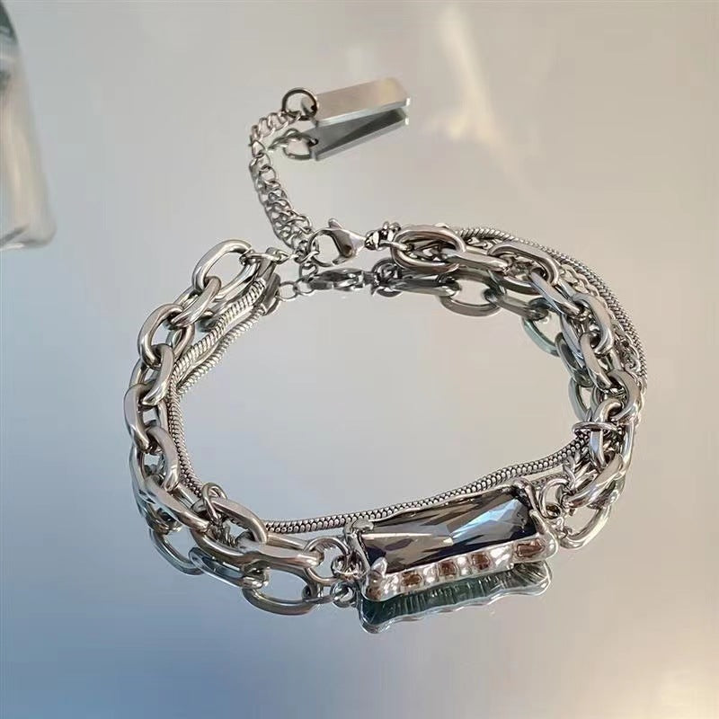 Brazalete de acero de titanio de empalme apilado de doble capa al por mayor